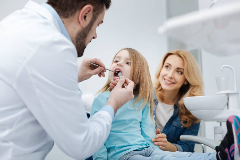 Child receiving preventative dentistry in Hood River clinic.